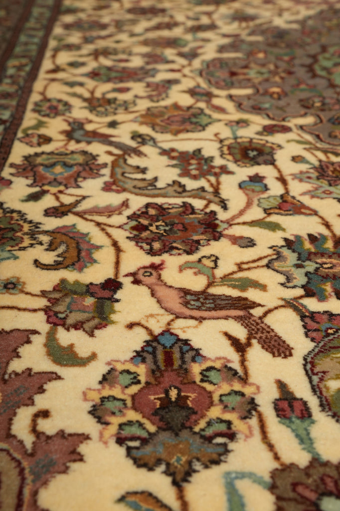 Close-up of a patterned rug with intricate designs.