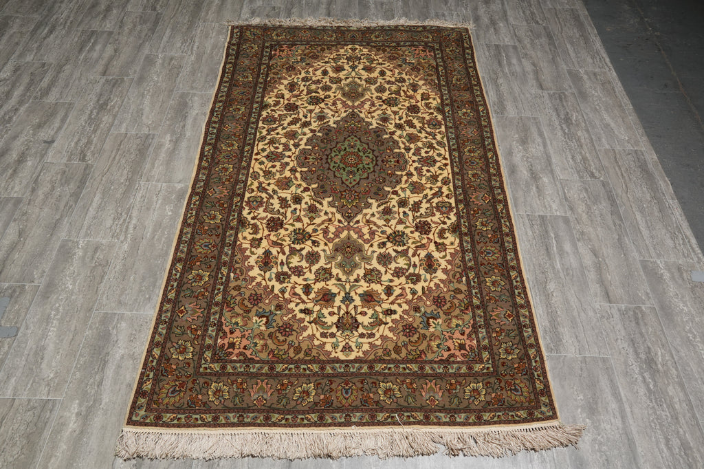 Decorative rug with intricate patterns on a wooden floor