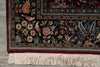 Load image into Gallery viewer, Decorative rug with floral and bird patterns on a wooden floor.