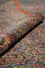 Load image into Gallery viewer, Close-up of a multicolored patterned rug with vibrant colors.