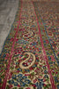 Load image into Gallery viewer, Close-up of a colorful patterned rug with intricate designs.