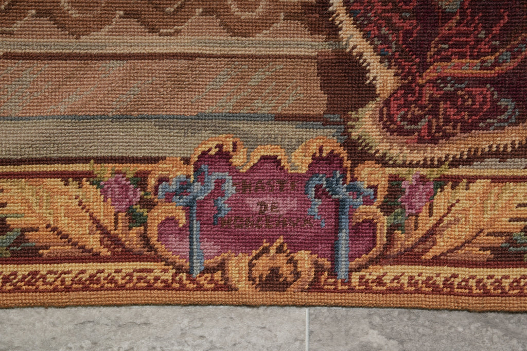 Close-up of a decorative rug with intricate patterns and colors.