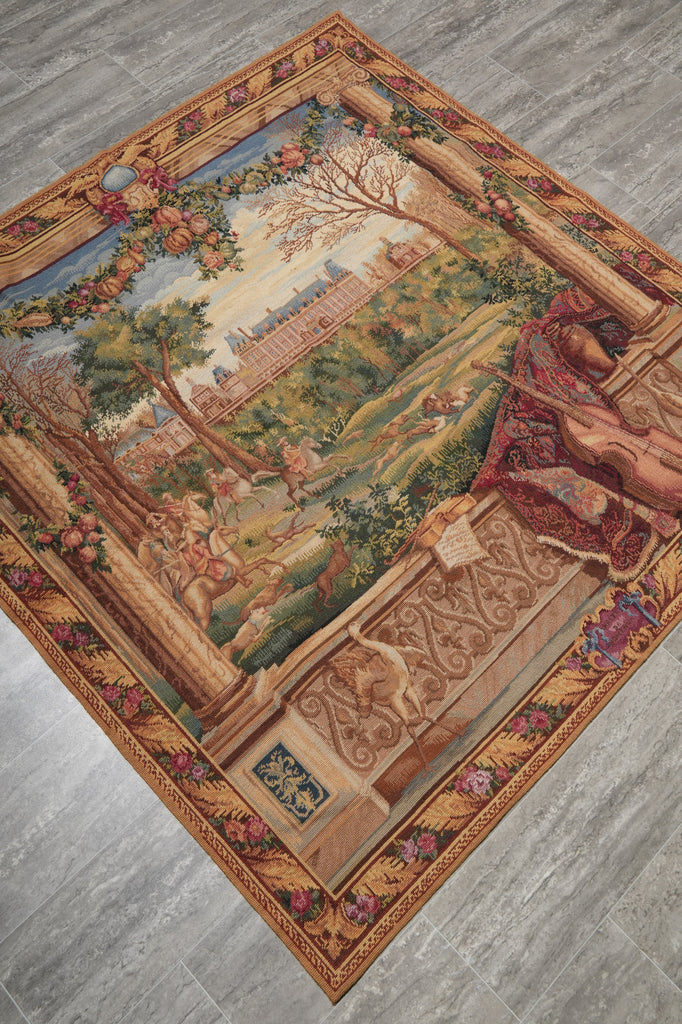 Decorative tapestry with a landscape design on a wooden floor