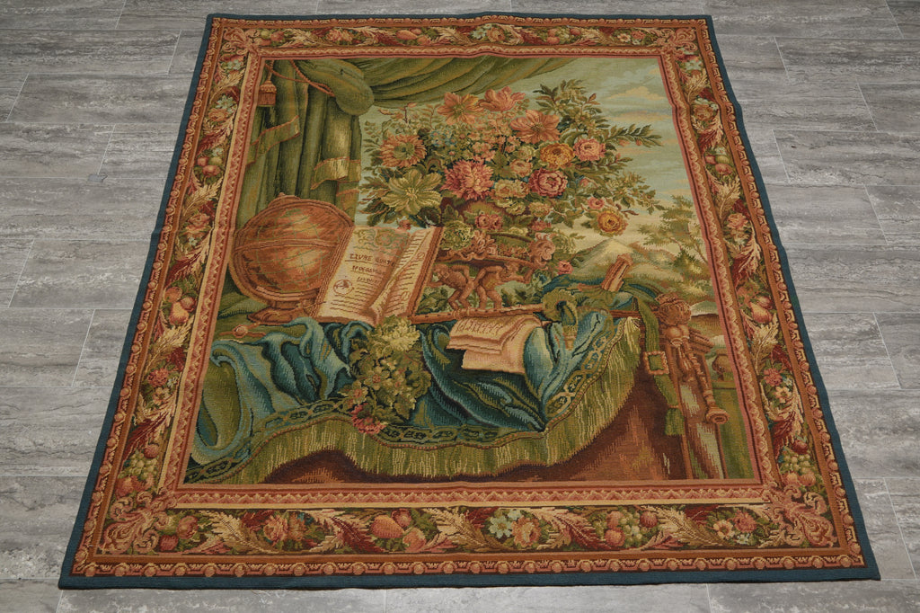Decorative rug with floral and classical design on a wooden floor