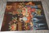 Load image into Gallery viewer, Decorative rug with a still life design featuring fruits, flowers, and a vase on a wooden surface.