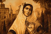Load image into Gallery viewer, Vintage-style illustration of a woman in a white headscarf with a scenic background