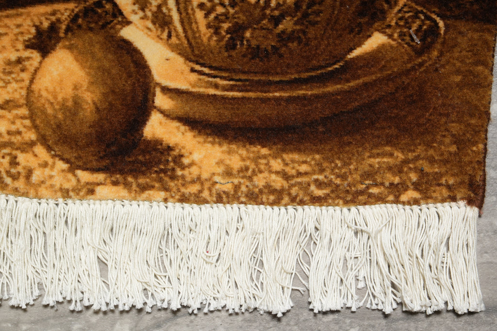 Close-up of a textured rug with a bowl and fruit on top
