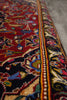 Load image into Gallery viewer, Close-up of a colorful patterned rug with intricate designs.