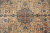 Load image into Gallery viewer, A close-up of an ornate traditional patterned rug with a central medallion and floral motifs in beige, blue, rust orange, and brown tones.