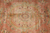 Load image into Gallery viewer, A square area rug with a faded medallion pattern in dusty pink, beige, and muted teal-green.