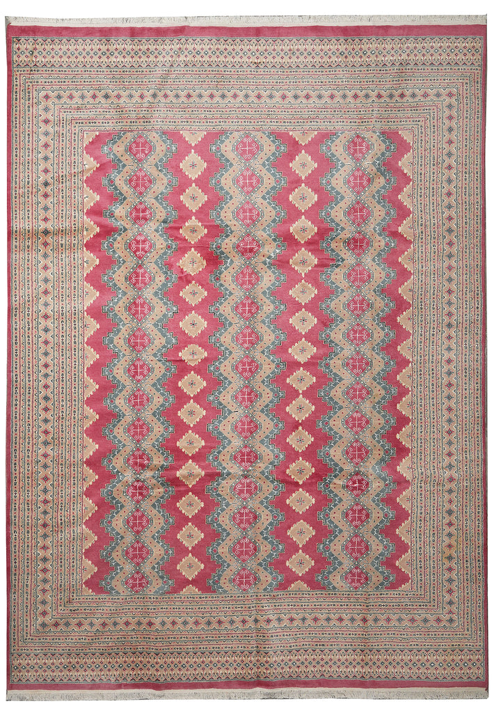 A square area rug with a traditional geometric pattern featuring vertical columns of pink and beige diamonds with blue-gray accents, surrounded by a red and beige patterned border.