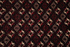 Load image into Gallery viewer, A close-up of a patterned fabric or wallpaper featuring a repeating geometric and floral motif in red, beige, and black.
