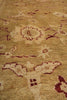Load image into Gallery viewer, A close-up view of a traditional area rug with a beige and cream base and dark red/burgundy floral motifs.