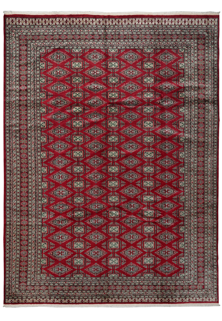 A traditional oriental area rug with a deep red field, featuring a repeating geometric diamond pattern in beige and gray, and a matching ornate border.