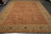 Load image into Gallery viewer, A large traditional oriental area rug with a warm rust-orange center field, detailed floral motifs, and a muted sage-green border, photographed from an overhead angle.