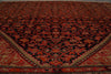 Load image into Gallery viewer, A traditional Persian-style area rug with an intricate floral and geometric pattern in deep red, black, and beige.