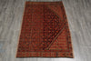 Load image into Gallery viewer, A rectangular traditional Persian-style area rug with a complex floral and geometric pattern, laid flat on a gray wood-look floor. The rug features a dominant rust-red and dark brown field with a large dark central diamond panel and a patterned border.