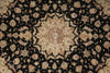 Load image into Gallery viewer, An ornate traditional Persian-style rug with a black background and a large central floral medallion, surrounded by intricate floral motifs in beige, pink, and muted blue.