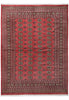 Load image into Gallery viewer, A traditional oriental area rug with a red field, featuring a central pattern of repeating medallions and a detailed multi-colored border.