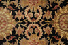 Load image into Gallery viewer, Close-up of an ornate floral patterned textile or rug with a black background and cream, tan, muted red, and gold motifs.