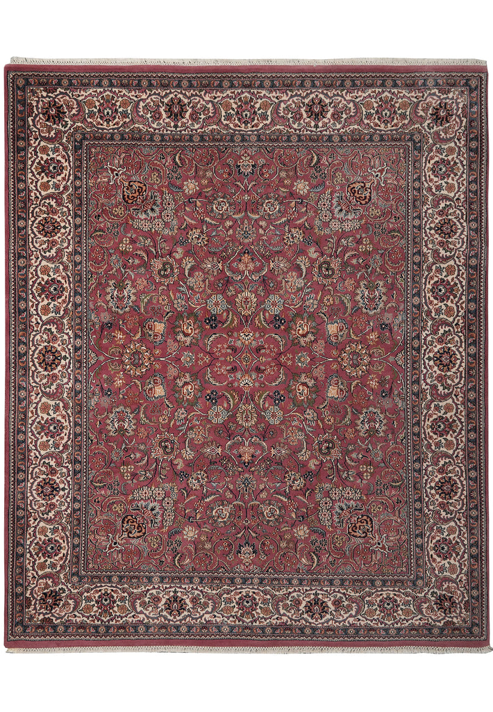A traditional oriental area rug with a dusty rose red field, featuring an intricate floral pattern and a dark brown border with cream accents.