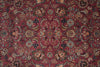 Load image into Gallery viewer, A close-up of an ornate floral patterned rug with a deep burgundy red background and intricate motifs in beige, blue, green, and brown.
