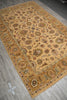 Load image into Gallery viewer, A large rectangular area rug with an intricate floral and medallion pattern, displayed diagonally on a gray wood-look floor.