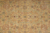 Load image into Gallery viewer, A close-up of an ornate floral patterned rug with a warm beige background and intricate vine motifs in muted red, blue, and green.