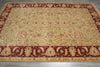 Load image into Gallery viewer, A rectangular area rug with an ornate traditional floral pattern, featuring a beige center field, deep red borders, and accents of green and blue in the detailed motifs.