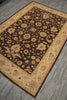 Load image into Gallery viewer, A rectangular area rug with a dark brown floral field and beige borders, shown laid out on a gray wood-look floor.