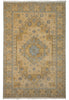 Load image into Gallery viewer, A rectangular area rug with a traditional medallion pattern in beige, tan, and muted blue-gray tones, shown flat against a white background.