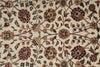 Load image into Gallery viewer, Close-up of a traditional floral patterned rug with cream background and brown, beige, and muted blue botanical motifs.