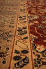 Load image into Gallery viewer, Close-up of a traditional patterned rug with a beige center field, a narrow dark patterned border, and a rust-red outer section with floral motifs.
