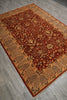 Load image into Gallery viewer, A traditional oriental area rug with a deep red central field, beige and gold floral motifs, and a patterned border, shown laid out on a gray wood floor.