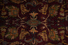 Load image into Gallery viewer, A close-up of an ornate traditional rug featuring a deep burgundy background with intricate floral and vine motifs in muted green, beige, and gold tones.
