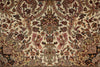 Load image into Gallery viewer, A close-up of an ornate traditional patterned rug with a cream background and intricate floral, bird, and scroll motifs in muted red, brown, green, and black tones.