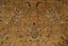 Load image into Gallery viewer, A close-up of an ornate floral patterned rug in warm tan and beige tones with muted green, pink, and brown detailing.