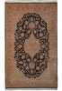 Load image into Gallery viewer, An oriental area rug with a traditional floral pattern, featuring a large central medallion in black and dusty rose, surrounded by a matching ornate border.
