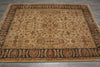 Load image into Gallery viewer, A rectangular vintage-style area rug with an intricate floral and medallion pattern, laid flat on a gray tiled floor.