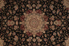 Load image into Gallery viewer, A traditional oriental rug with an intricate floral pattern on a black background, featuring a central medallion and surrounding floral motifs in beige, rust red, and muted blue.