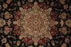 Load image into Gallery viewer, A close-up of an ornate traditional rug featuring a central medallion and floral motifs in deep burgundy, beige, and black.