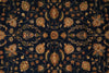 Load image into Gallery viewer, A close-up of an ornate floral patterned fabric or rug with a dark navy blue background and intricate gold, beige, and rust-colored botanical motifs.