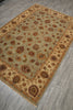 Load image into Gallery viewer, A rectangular area rug with an intricate floral and medallion pattern, shown from an elevated angle on a gray wood-look floor. The rug features a light sage green center field, a beige inner border, and a warm rust-orange outer border.