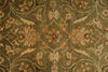 Load image into Gallery viewer, A close-up of an ornate floral patterned fabric or rug in muted olive green, beige, and rust tones, showing detailed woven texture and repeating motifs.