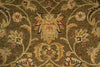 Load image into Gallery viewer, Close-up of an ornate floral rug pattern in olive brown, beige, cream, muted blue, and burgundy, showing detailed woven texture.
