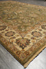 Load image into Gallery viewer, An ornate traditional area rug with a beige and olive-green base, featuring intricate floral motifs and a detailed border, shown on a gray wood-look floor.