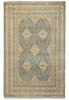 Load image into Gallery viewer, A rectangular area rug with a traditional geometric pattern in muted blue-gray, beige, and cream tones, featuring a central diamond motif and ornate border details.