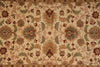 Load image into Gallery viewer, An ornate traditional area rug with a beige background and a detailed floral pattern in muted brown, sage green, and terracotta tones.