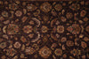 Load image into Gallery viewer, A close-up of an ornate traditional rug with a dark brown background and intricate floral motifs in beige, rust, and muted gold.