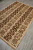Load image into Gallery viewer, A rectangular area rug with a traditional floral pattern, shown at an angle on a gray wood-look floor. The rug features alternating vertical stripes of dark brown floral motifs, beige bands, and light sage green stripes.